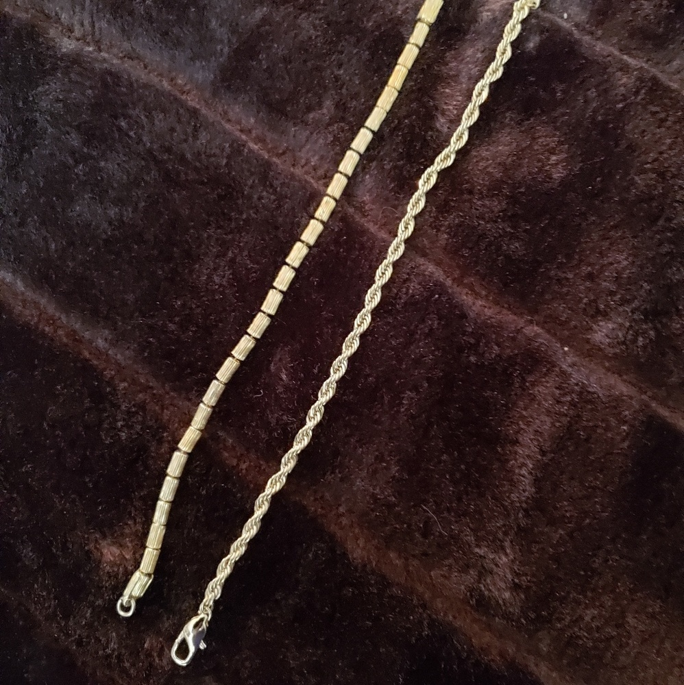 2- gold-toned bracelets
